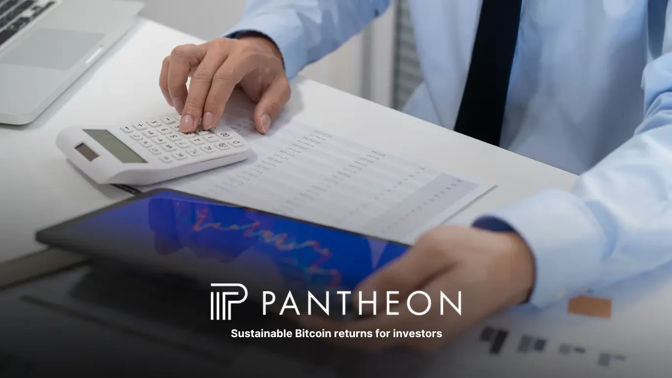 Investor reviewing financial data on a tablet and calculator